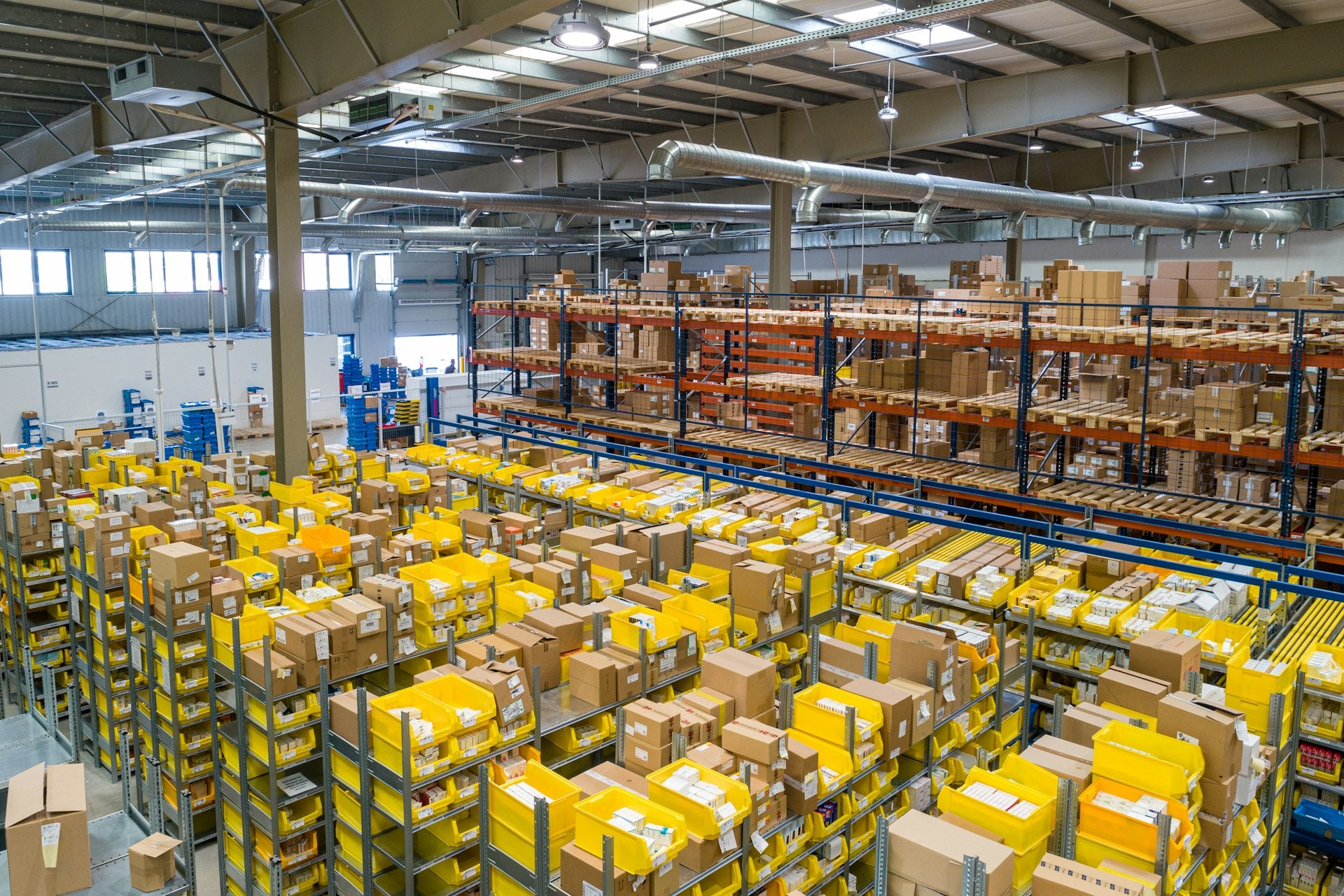 Industrial warehouse with rows of shelving